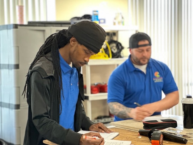 Student meeting with trade school advisor to choose the right program